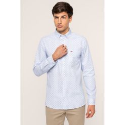 Koszula Tommy Jeans Tjm Dobby DM0DM07139. Niebieskie koszule męskie Tommy Jeans, xxl, bez wzorów, z jeansu, casualowe, bez kołnierzyka, bez rękawów. W wyprzedaży za 239,00 zł.