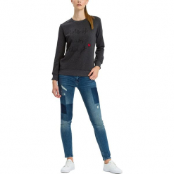 Dżinsy "Adriana" - Skinny fit - w kolorze niebieskim. Niebieskie rurki damskie marki Cross Jeans, z aplikacjami. W wyprzedaży za 136,95 zł.