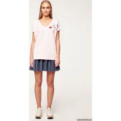 T-shirt Candy. Różowe t-shirty damskie Pakamera, bez wzorów, z bawełny, klasyczne, z klasycznym kołnierzykiem. Za 299,00 zł.