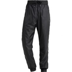 Wood Wood ELLIOT TROUSERS Spodnie treningowe black. Czarne spodnie dresowe męskie marki Wood Wood, xl, z poliesteru. Za 689,00 zł.