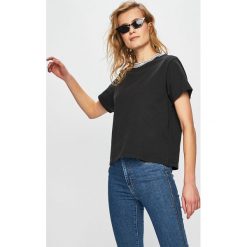 Levi's - Top. Czarne bluzki damskie Levi's®, s, bez wzorów, z elastanu, z okrągłym kołnierzem. W wyprzedaży za 64,90 zł.