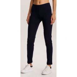 Granatowe Legginsy Grynielle. Niebieskie legginsy damskie Renee, s, bez wzorów. Za 39,99 zł.
