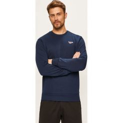 Reebok Classic - Bluza. Niebieskie bluzy męskie s, z elastanu, z okrągłym kołnierzem. Za 199,90 zł.