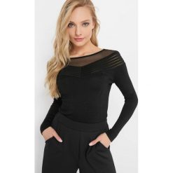 Sweter z metaliczną nitką. Czarne swetry klasyczne damskie Orsay, xs, z dzianiny, dekolt w kształcie v. Za 89,99 zł.