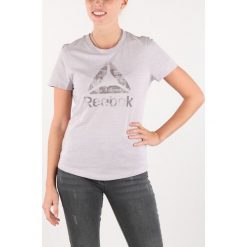 Reebok Koszulka Fioletowy. Fioletowe koszulki damskie Reebok, s, z nadrukiem, z bawełny, bez kołnierzyka, z krótkim rękawem. Za 119,95 zł.