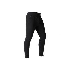 Spodnie dresowe skinny Gym & Pilates 500 zip męskie. Czarne spodnie męskie DOMYOS, xs, bez wzorów, z elastanu. Za 64,99 zł.