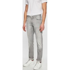 Tommy Hilfiger - Jeansy Denton. Szare jeansy męskie TOMMY HILFIGER, bez wzorów, z obniżonym stanem. W wyprzedaży za 259,90 zł.