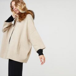 Kardigan w kolorze beżowym. Brązowe swetry damskie Rodier, m, z wełny. W wyprzedaży za 399,95 zł.
