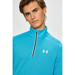 Under Armour - Bluza. Niebieskie bluzy męskie Under Armour, s, bez wzorów, z poliesteru, z kapturem, z krótkim rękawem, krótkie, bez kaptura. W wyprzedaży za 129,90 zł.