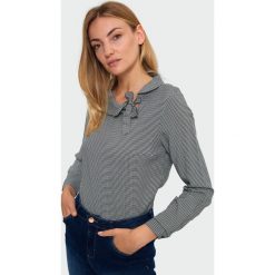 Bluzka z nadrukiem w pepitkę. Bluzki damskie Greenpoint, z nadrukiem, z wiskozy, bez kołnierzyka, bez rękawów. Za 79,99 zł.