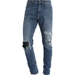Tiger of Sweden Jeans EVOLVE Jeans Skinny Fit light blue. Niebieskie jeansy męskie marki Tiger of Sweden Jeans. Za 709,00 zł.