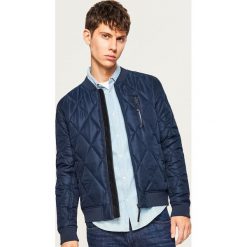 Pikowana kurtka bomber - Granatowy. Niebieskie kurtki męskie bomber Reserved, l. Za 119,99 zł.