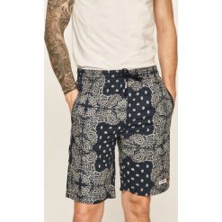 Tommy Jeans - Szorty. Niebieskie spodenki i szorty męskie Tommy Jeans, s, bez wzorów, z bawełny, casualowe. Za 359,90 zł.
