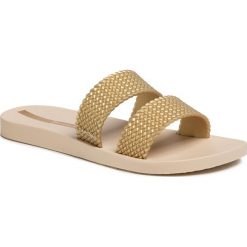 Klapki IPANEMA - City Fem 26223 Beige/Gold 20352. Żółte klapki damskie Ipanema, bez wzorów, z tworzywa sztucznego, bez obcasa. W wyprzedaży za 59,00 zł.