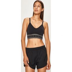 Under Armour - Biustonosz sportowy. Czarne biustonosze sportowe damskie Under Armour, s, bez wzorów, z elastanu. Za 159,90 zł.