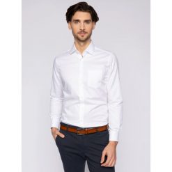 Koszula Pierre Cardin 5797/000/27000. Niebieskie koszule męskie Pierre Cardin, m, bez wzorów, z bawełny, biznesowe, bez kołnierzyka, bez rękawów. W wyprzedaży za 219,00 zł.