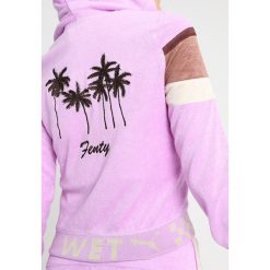 Fenty PUMA by Rihanna ZIP UP RACING Kurtka wiosenna violet tulle. Fioletowe kurtki damskie marki Fenty PUMA by Rihanna, xxs, bez wzorów, z bawełny, bez kaptura. Za 839,00 zł.