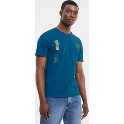 Puma Depth Koszulka Niebieski. Niebieskie podkoszulki męskie Puma, s, z nadrukiem, z bawełny, bez kołnierzyka, krótkie. Za 111,95 zł.