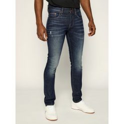 Jeansy Slim Fit TOMMY HILFIGER Distressed MW0MW11729. Niebieskie jeansy męskie TOMMY HILFIGER, m, bez wzorów. W wyprzedaży za 299,00 zł.