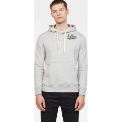 Bluza w kolorze jasnoszarym. Szare bluzy męskie G-Star, m, z nadrukiem, z bawełny, z kapturem, bez rękawów, bez kaptura. W wyprzedaży za 259,95 zł.