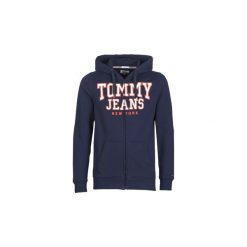 Bluzy Tommy Jeans TJM ESSENTIAL GRAPHIC ZIPTHRU. Niebieskie bluzy męskie marki Tommy Jeans, s, bez wzorów, z jeansu, bez kołnierzyka, bez rękawów, bez kaptura. Za 351,20 zł.