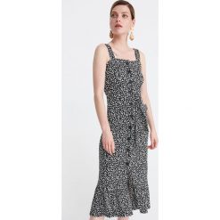 Wzorzysta sukienka midi - Wielobarwny. Sukienki damskie Reserved, bez wzorów, bez kołnierzyka, bez rękawów, midi. Za 199,99 zł.