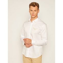 Koszula Armani Exchange 6HZC43 ZNAUZ 1100. Białe koszule męskie Armani Exchange, m, bez wzorów, casualowe, bez kołnierzyka, bez rękawów. Za 419,00 zł.