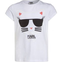 KARL LAGERFELD Tshirt z nadrukiem weiss. Białe t-shirty damskie KARL LAGERFELD, z nadrukiem, z bawełny. Za 179,00 zł.