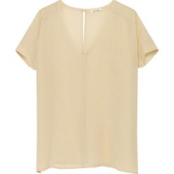 Jedwabna bluzka w kolorze beżowym. Brązowe bluzki damskie American Vintage, m, bez wzorów, z jedwabiu, z dekoltem na plecach, bez rękawów. W wyprzedaży za 209,95 zł.