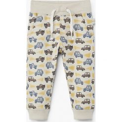 Mango Kids - Spodnie dziecięce Mateopri 80-104 cm. Szare spodnie chłopięce marki Mango Kids, z bawełny. W wyprzedaży za 29,90 zł.