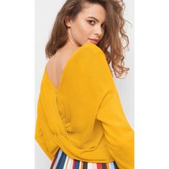 Sweter oversize z supłem. Żółte swetry damskie Orsay, s, bez wzorów, z bawełny, bez rękawów, długie, bez kaptura. W wyprzedaży za 55,00 zł.