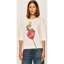 Love Moschino - Sweter. Białe swetry damskie Love Moschino, s, z aplikacjami, z bawełny, bez rękawów, bez kaptura. Za 1049,00 zł.