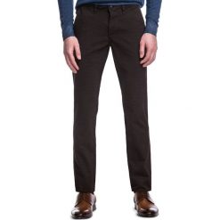 Spodnie FRANCESCO SMKS030116. Pomarańczowe spodnie męskie Giacomo Conti, m, bez wzorów, z elastanu. Za 259,00 zł.