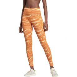 Adidas Performance Believe This Wanderlust Legginsy Pomarańczowy. Pomarańczowe spodnie damskie adidas Performance, xs, bez wzorów, z elastanu. Za 335,95 zł.
