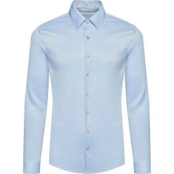 Koszula Calvin Klein Till Easy Iron K10K103027. Niebieskie koszule męskie Calvin Klein, m, bez wzorów, casualowe, bez kołnierzyka, bez rękawów. Za 349,00 zł.