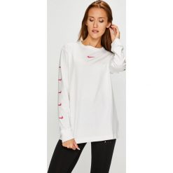 Nike Sportswear - Bluzka. Szare bluzki asymetryczne Nike Sportswear, l, z nadrukiem, z bawełny, casualowe, z okrągłym kołnierzem. W wyprzedaży za 129,90 zł.
