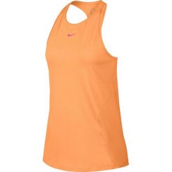 Top sportowy w kolorze pomarańczowym. Pomarańczowe topy damskie Nike Women, l, z nadrukiem, ze skóry, z okrągłym kołnierzem. W wyprzedaży za 56,95 zł.