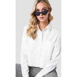 NA-KD Trend Koszula jeansowa z surowym brzegiem - White. Białe koszule jeansowe damskie NA-KD Trend. Za 161,95 zł.