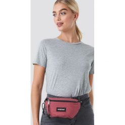 Eastpak Torebka Springer - Pink. Różowe torebki klasyczne damskie marki Eastpak, w paski, bez dodatków. Za 100,95 zł.