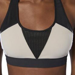 DAMSKI BIUSTONOSZ REEBOK HERO RACER PADDED (S). Biustonosze sportowe damskie Reebok, s, bez wzorów, z poliesteru, na fitness i siłownię. W wyprzedaży za 139,99 zł.