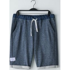 Dresowe szorty melanż - Granatowy. Niebieskie spodenki i szorty męskie Cropp, s, bez wzorów, z dresówki. W wyprzedaży za 34,99 zł.