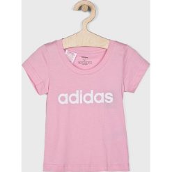 Adidas Performance - Top dziecięcy 110-170 cm. Różowe bluzki dziewczęce adidas Performance, z nadrukiem, z bawełny, z okrągłym kołnierzem, z krótkim rękawem, krótkie, bez kaptura. Za 59,90 zł.