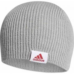 CZAPKA ZIMOWA ADIDAS BEANIE (DAMSKA). Szare czapki damskie Adidas, na zimę, bez wzorów, z dzianiny. Za 59,99 zł.