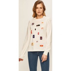 Nike Sportswear - Longsleeve. Białe topy damskie Nike Sportswear, s, z aplikacjami, z bawełny, casualowe, z okrągłym kołnierzem. Za 189,90 zł.