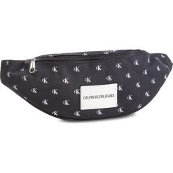 Saszetka nerka CALVIN KLEIN JEANS - Sport Essential Mono Waistbag K40K400846 910. Czarne nerki damskie Calvin Klein Jeans, bez wzorów, z jeansu, młodzieżowe, bez dodatków. W wyprzedaży za 219,00 zł.