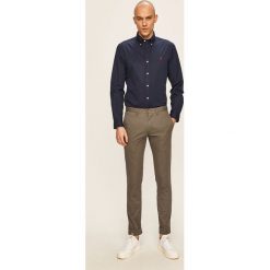 Polo Ralph Lauren - Spodnie. Szare spodnie męskie Polo Ralph Lauren, na co dzień, bez wzorów, z elastanu. Za 639,90 zł.