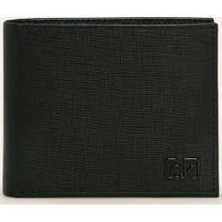 Calvin Klein - Portfel skórzany. Czarne portfele męskie Calvin Klein, bez wzorów, ze skóry. Za 299,90 zł.