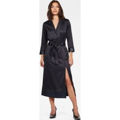 G-Star Raw - Sukienka. Niebieskie sukienki damskie G-Star RAW, na co dzień, s, bez wzorów, z poliesteru, retro, bez kołnierzyka, bez rękawów, midi, proste. W wyprzedaży za 639,90 zł.