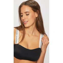 Calvin Klein Jeans - Biustonosz kąpielowy. Czarne stroje kąpielowe damskie Calvin Klein Jeans, s, bez wzorów, z elastanu. Za 229,90 zł.