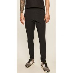 Under Armour - Spodnie. Czarne spodnie męskie Under Armour, s, bez wzorów, z elastanu. W wyprzedaży za 239,90 zł.